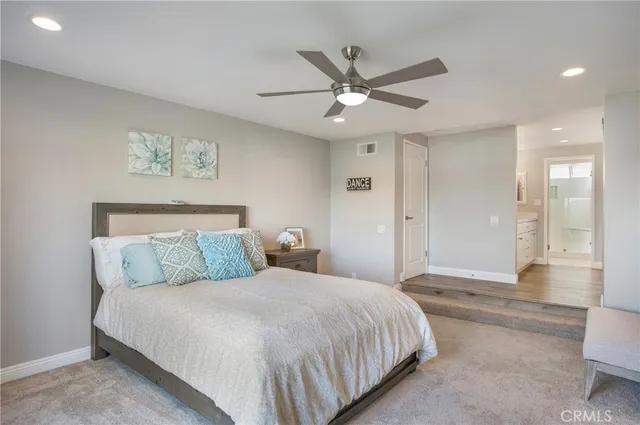 a bathroom with a double vanity sink mirror and double