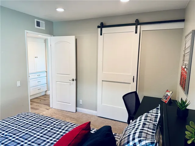 a bathroom with a shower and a sink