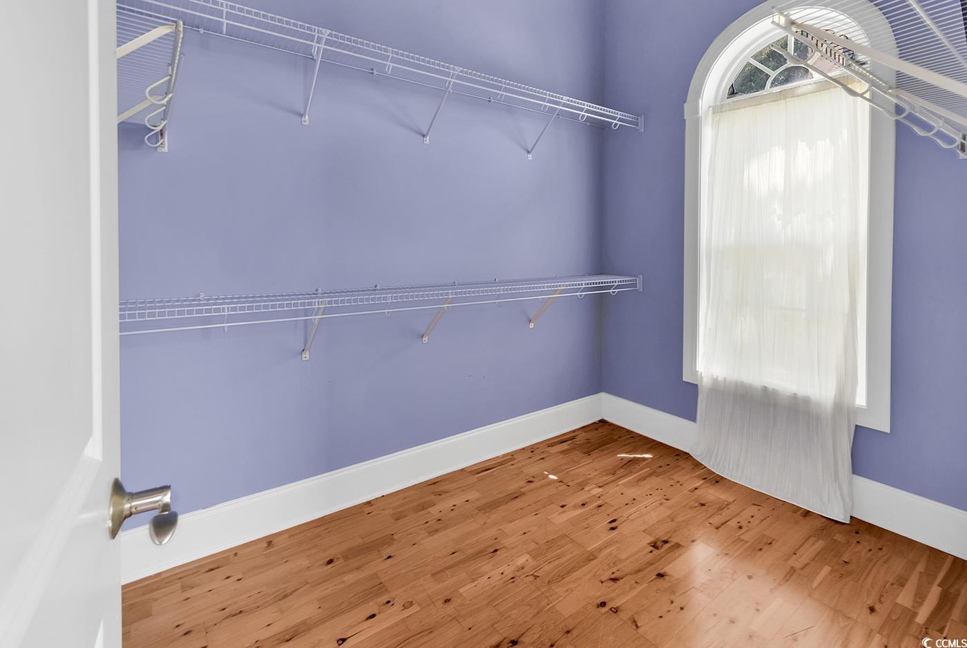 553 Linton Park Road Myrtle Beach, SC 29579 - Photo 26 of 40 Walk in closet with wood finished floors