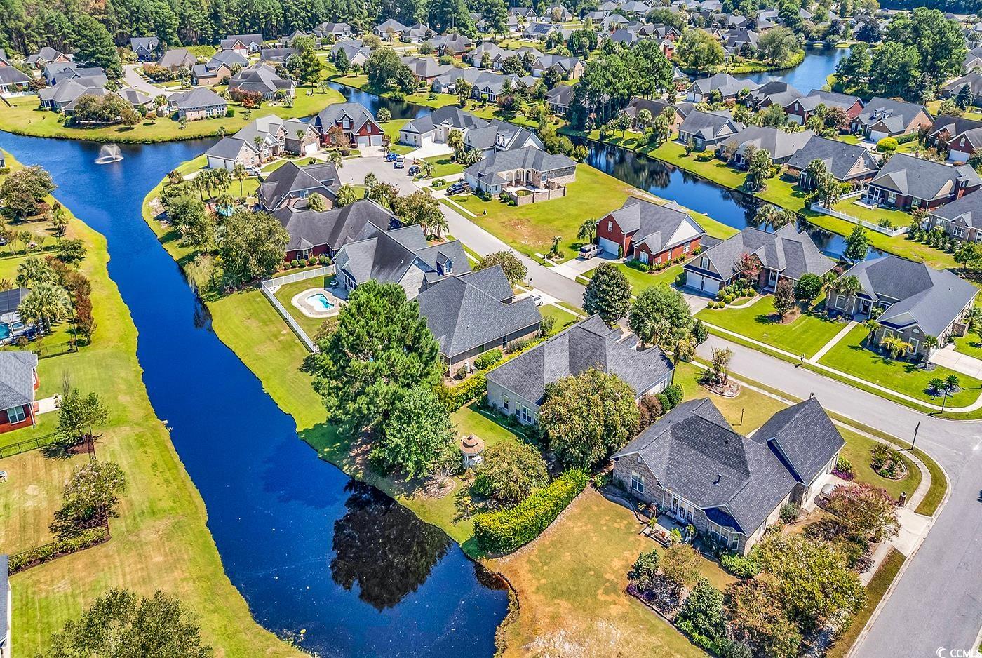 553 Linton Park Road Myrtle Beach, SC 29579 - Photo 35 of 40 Aerial view of residential area featuring a nearby body of water