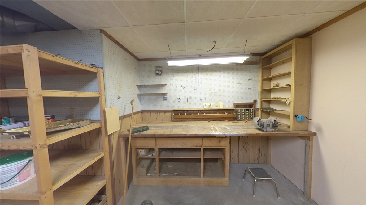 109 Afton Lake Road Afton, NY 13730 - Photo 41 of 49 Workshop with wood furnace