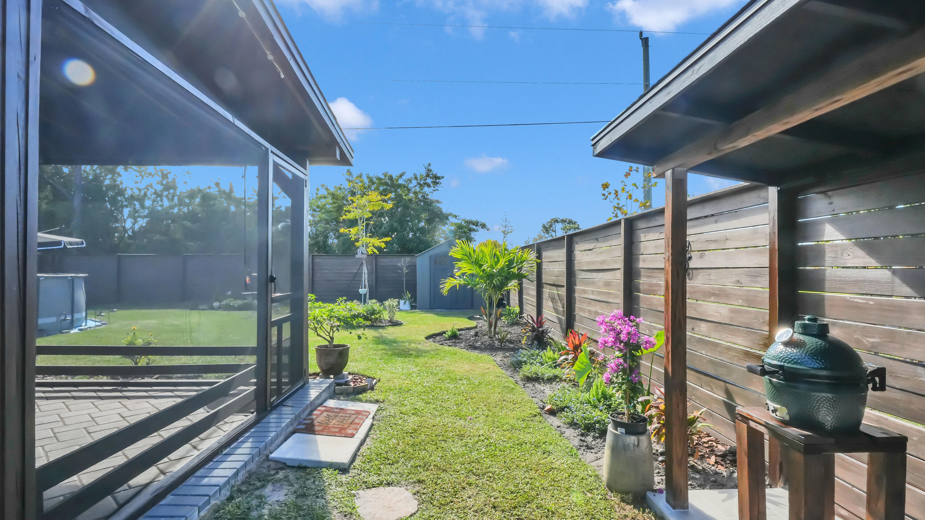 1382 Southwest Becker Road Port St. Lucie, FL 34953 - Photo 44 of 55 side yard
