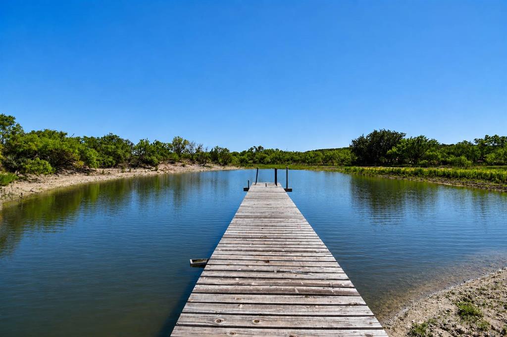 8228 Us Highway Rochelle, TX 76872 - Photo 2 of 36 a view of wooden floor and a lake view