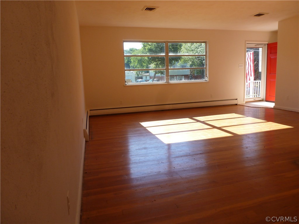 7408 Oak Ridge Street Henrico, VA 23294 - Photo 12 of 31 View of Living Room from Dining Room.Wood Floors t