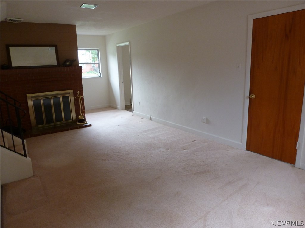 7408 Oak Ridge Street Henrico, VA 23294 - Photo 20 of 31 Family room. Fresh paint and just cleaned carpet.
