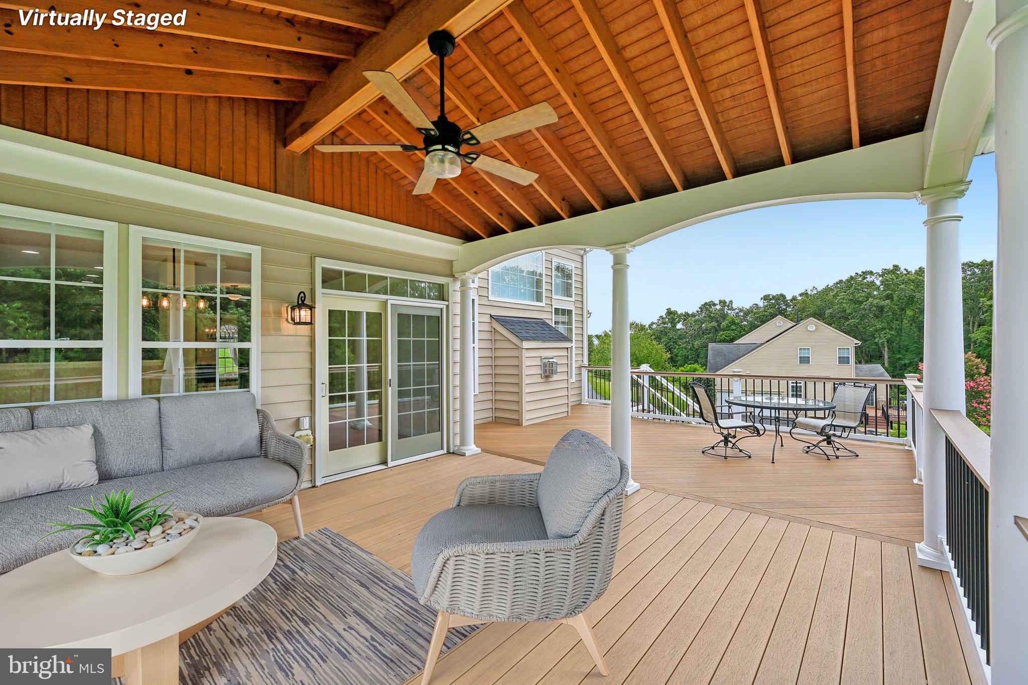 705 Jaclyn Circle Freeland, MD 21053 - Photo 40 of 45 a balcony with furniture and wooden floor