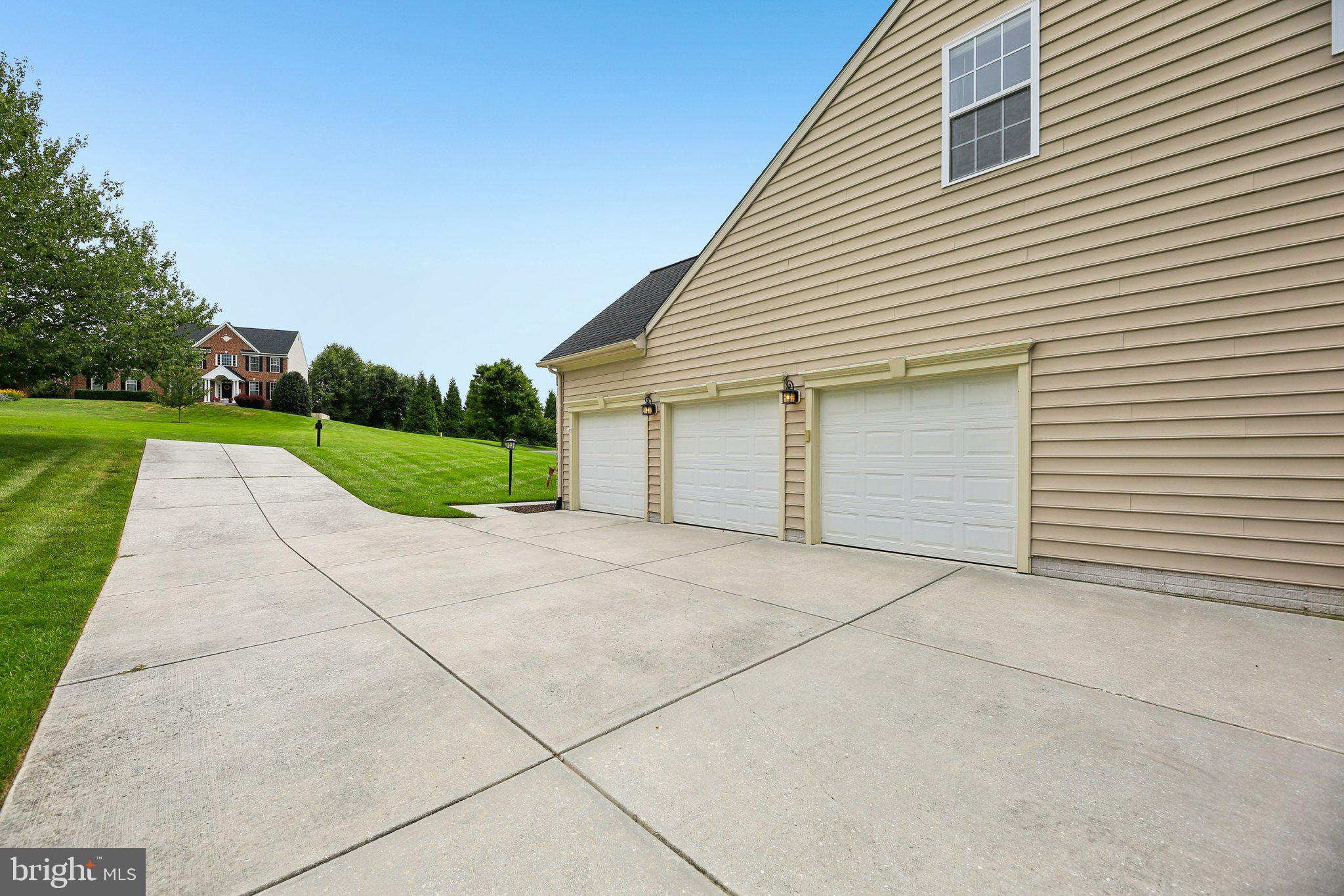 705 Jaclyn Circle Freeland, MD 21053 - Photo 42 of 45 a view of backyard of house and garage