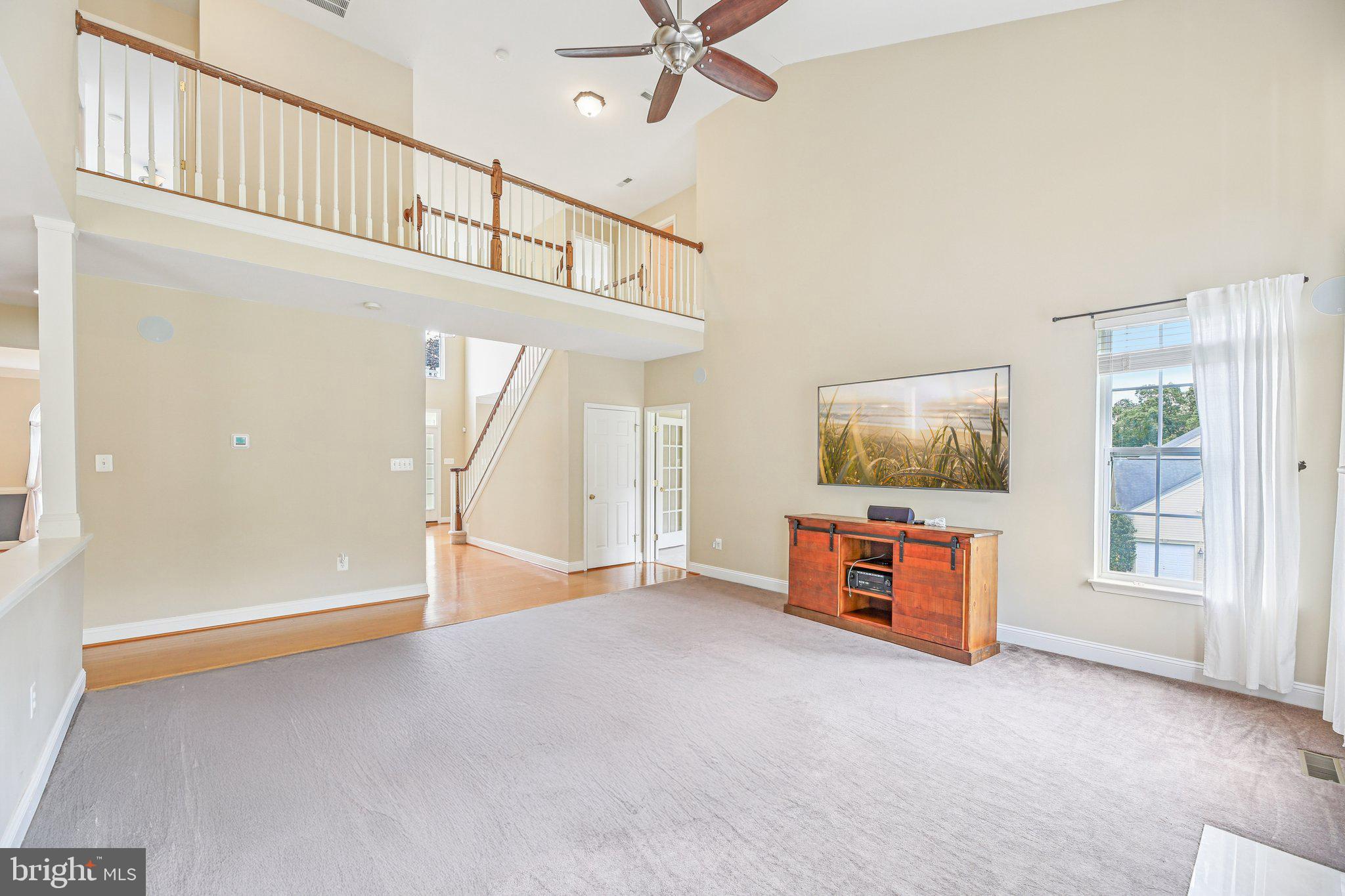 705 Jaclyn Circle Freeland, MD 21053 - Photo 6 of 45 an empty room with fan and windows