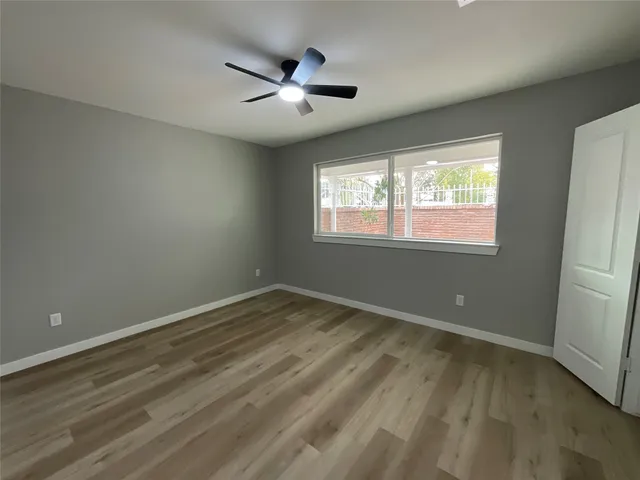 a bathroom with a sink and shower