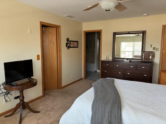 a workspace with furniture and a window