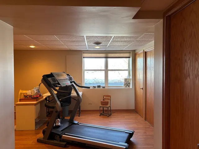 a view of a deck with a yard