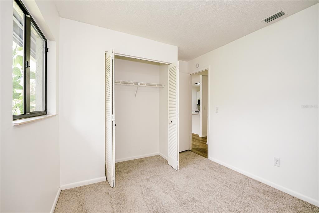 26 Seneca Path Palm Coast, FL 32164 - Photo 10 of 15 an empty room with windows and closet