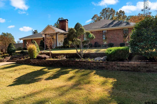 a view of a house with swimming pool