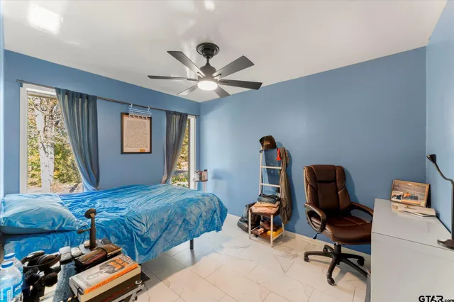 a room with furniture and a window