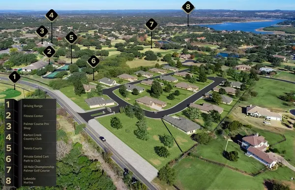 an aerial view of a residential houses with outdoor space