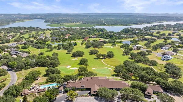 an aerial view of residential building with outdoor space