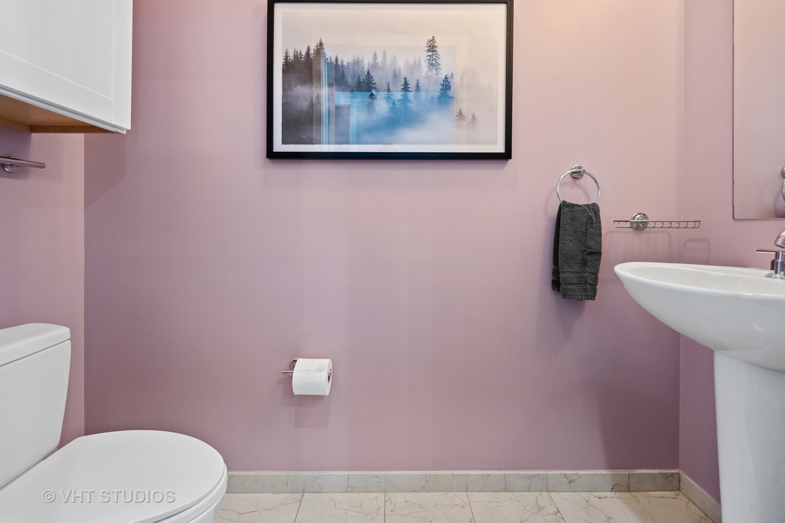 3920 North Sheridan Road, Unit 403 Chicago, IL 60613 - Photo 11 of 13 a bathroom with a sink and a toilet