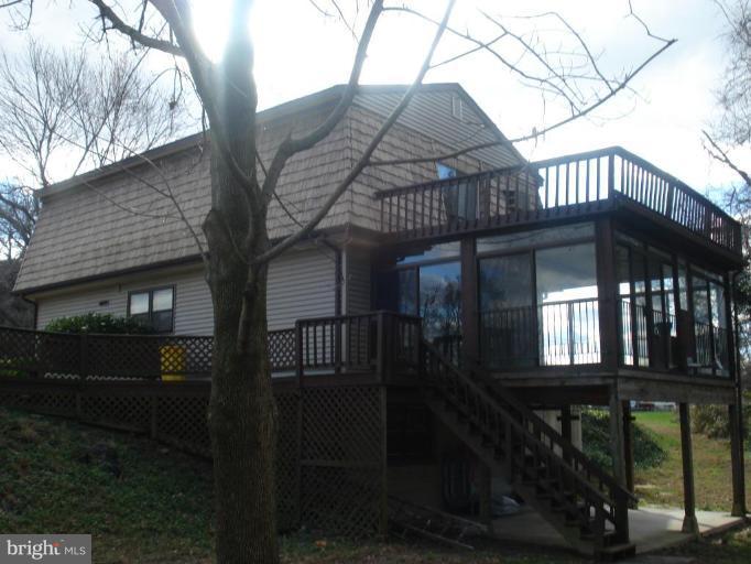 816 Riverside Drive Pasadena, MD 21122 - Photo 2 of 16 Enclosed rear porch 18x15