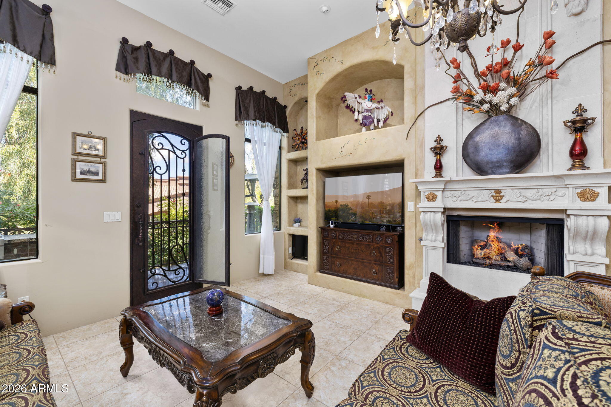 7199 East Ridgeview Place, Unit 102 Carefree, AZ 85377 - Photo 16 of 36 Fireplace and Door Out TO Patio