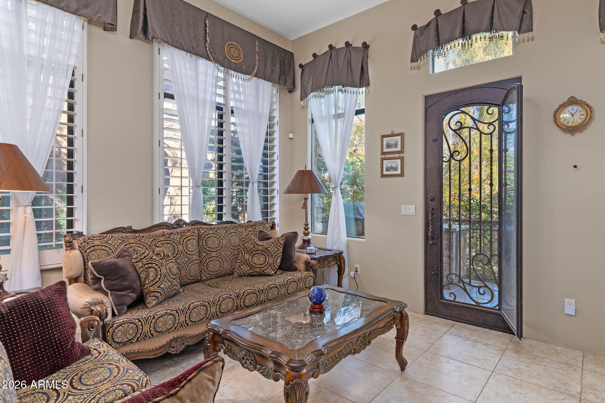 7199 East Ridgeview Place, Unit 102 Carefree, AZ 85377 - Photo 17 of 36 Living Room and Door To Patio