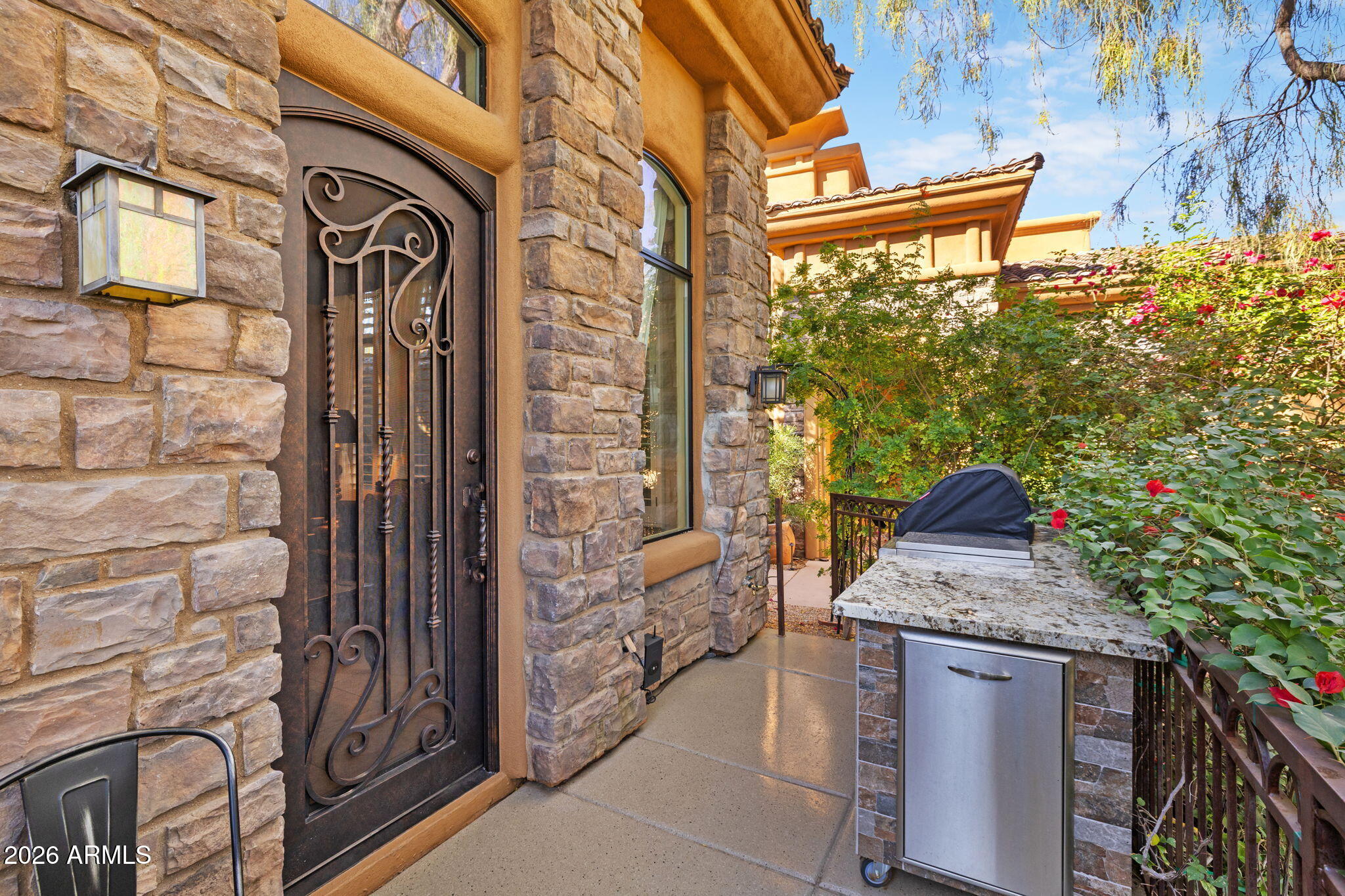 7199 East Ridgeview Place, Unit 102 Carefree, AZ 85377 - Photo 4 of 36 Patio with BBQ