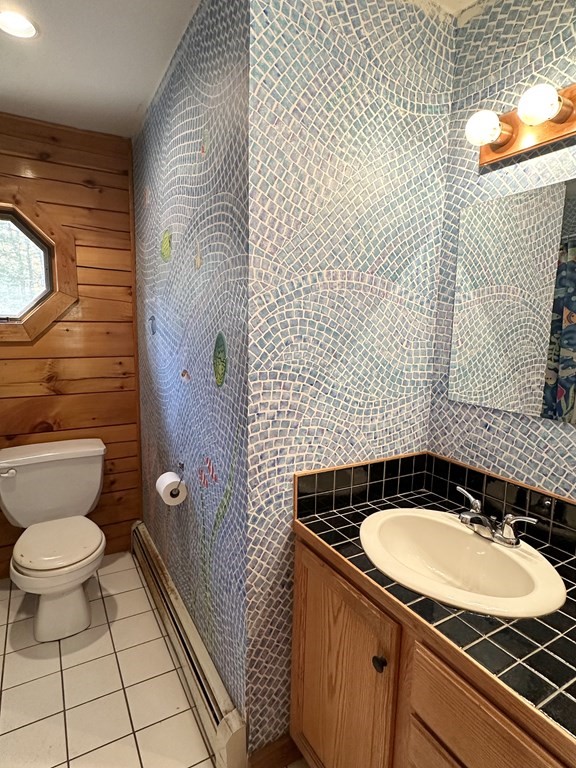 89 NW Road Westhampton, MA 01027 - Photo 22 of 29 a bathroom with a sink a toilet and shower