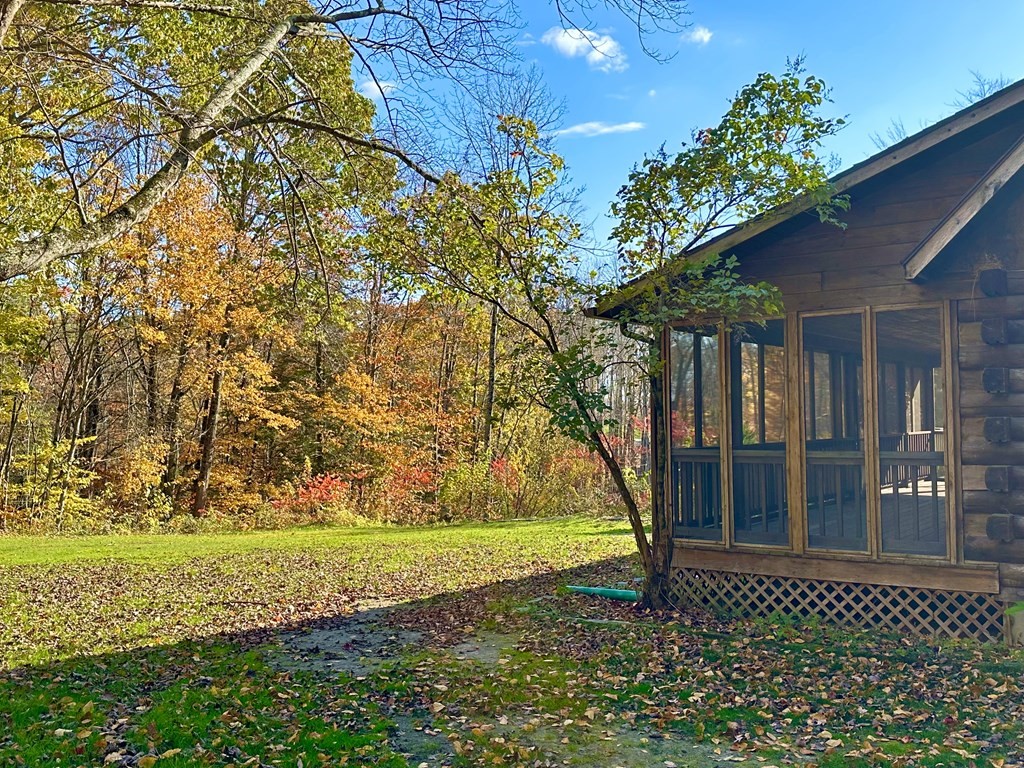 89 NW Road Westhampton, MA 01027 - Photo 28 of 29 a view of a house with backyard and tree