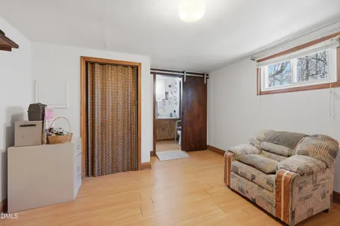 a room with furniture and a flat screen tv