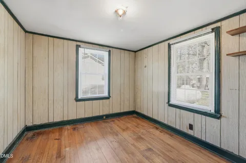 a bedroom with furniture and closet