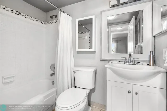 a view of a swimming pool with outdoor seating