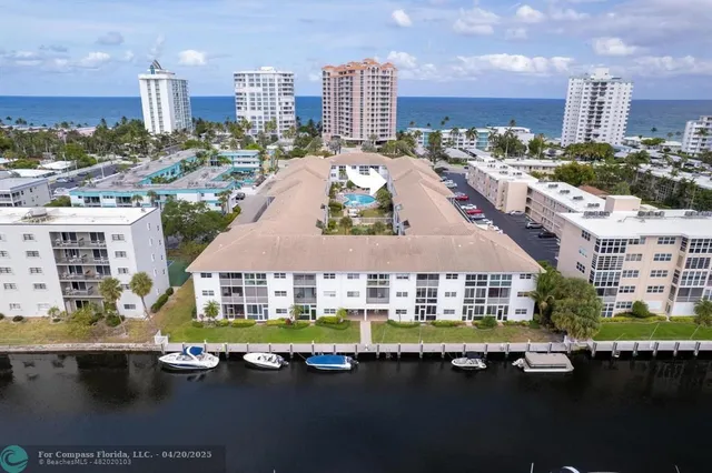 a kitchen with a refrigerator stove and sink
