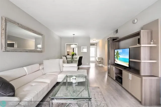 a bedroom with a bed and a table