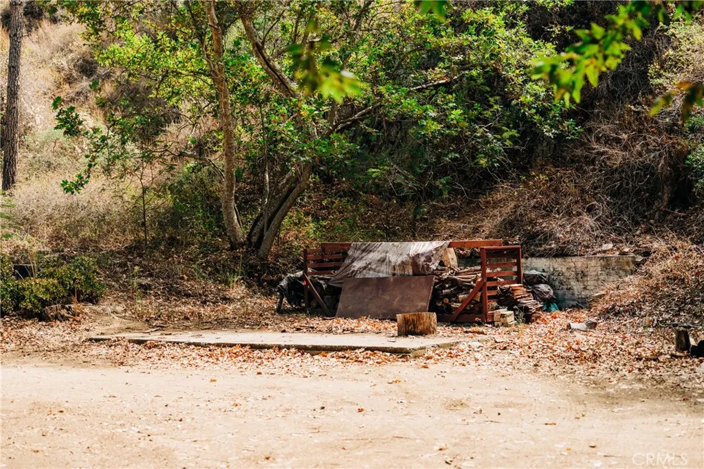 0 Hot Springs Canyon Road, Unit 26 San Juan Capistrano, CA 92675 - Photo 15 of 59 a view of a yard covered in snow