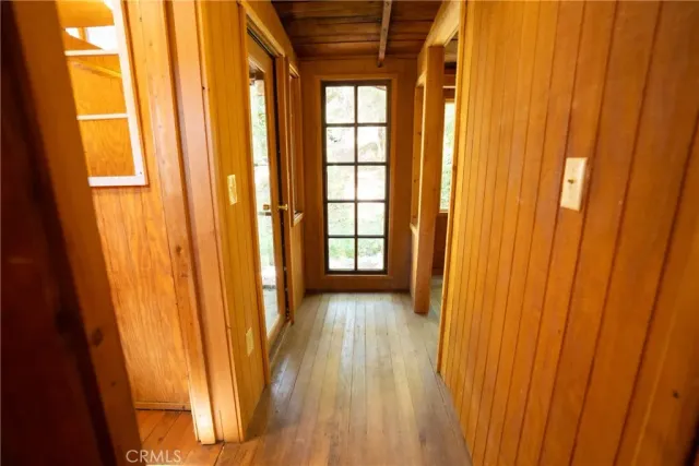 a bathroom with a window and a shower
