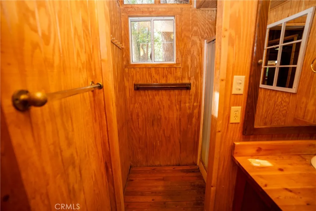 0 Hot Springs Canyon Road, Unit 26 San Juan Capistrano, CA 92675 - Photo 32 of 59 a bathroom with a window and a shower