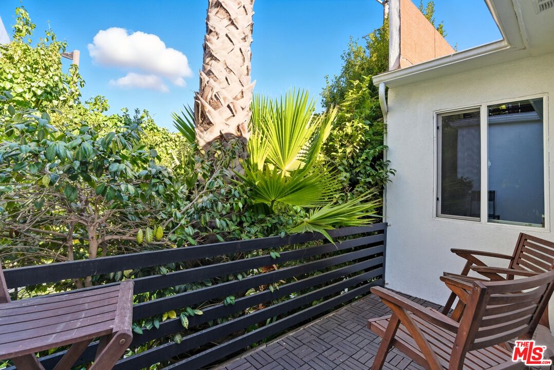 10915 Ayres Avenue Los Angeles, CA 90064 - Photo 17 of 51 a view of a yard with sitting area