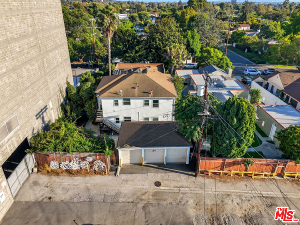 10915 Ayres Avenue Los Angeles, CA 90064 - Photo 2 of 51 an aerial view of a house with a yard and potted plants