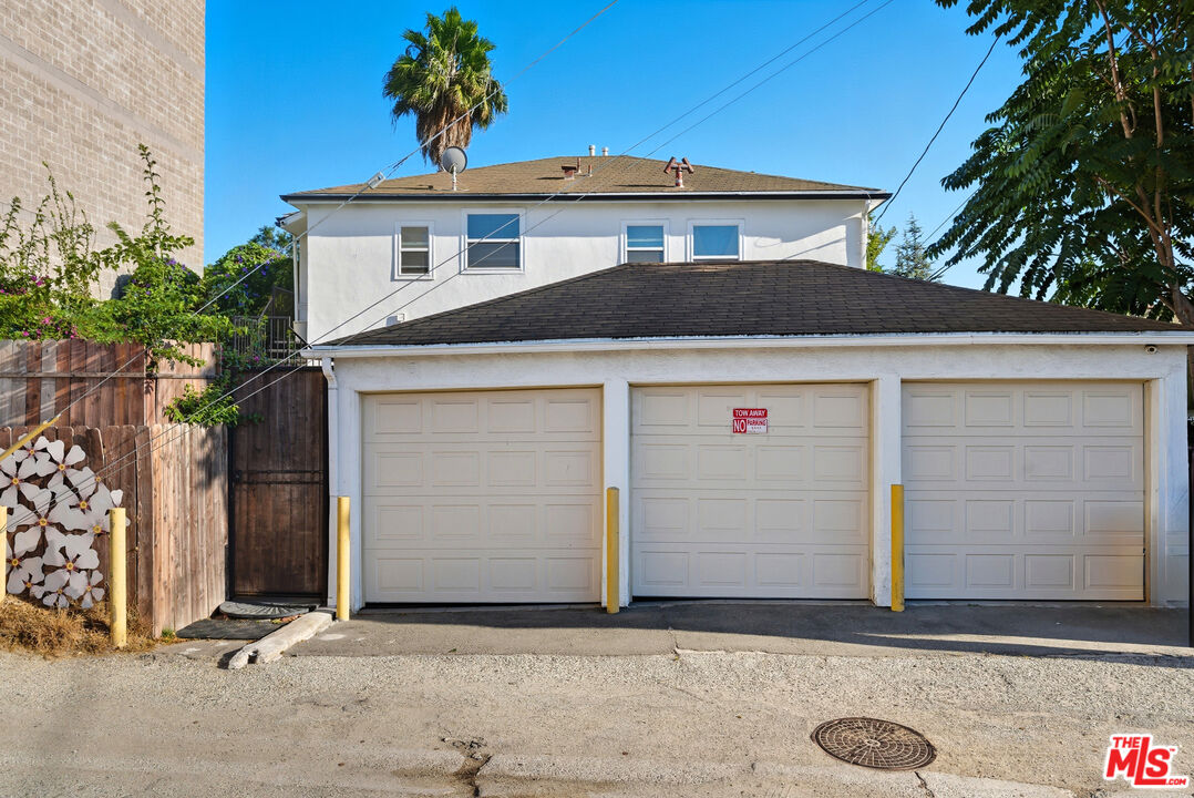 10915 Ayres Avenue Los Angeles, CA 90064 - Photo 23 of 51 a front view of a house with garage