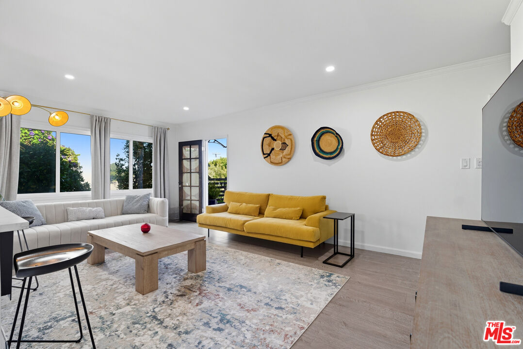 10915 Ayres Avenue Los Angeles, CA 90064 - Photo 37 of 51 a living room with furniture and window