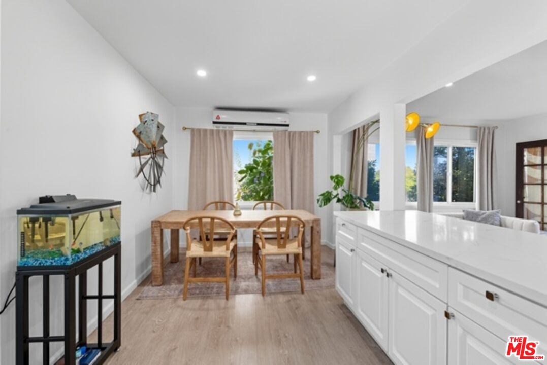 10915 Ayres Avenue Los Angeles, CA 90064 - Photo 41 of 51 a view of a dining room with furniture window and outside view
