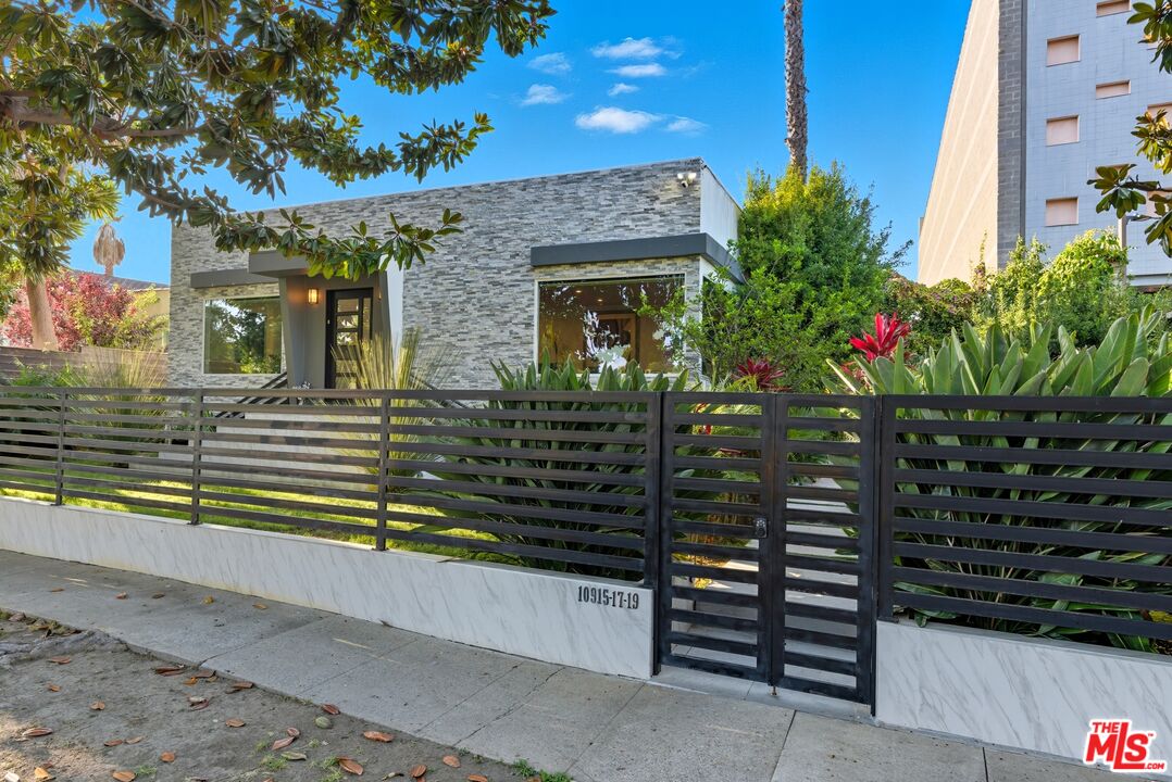 10915 Ayres Avenue Los Angeles, CA 90064 - Photo 51 of 51 a view of a house with a street