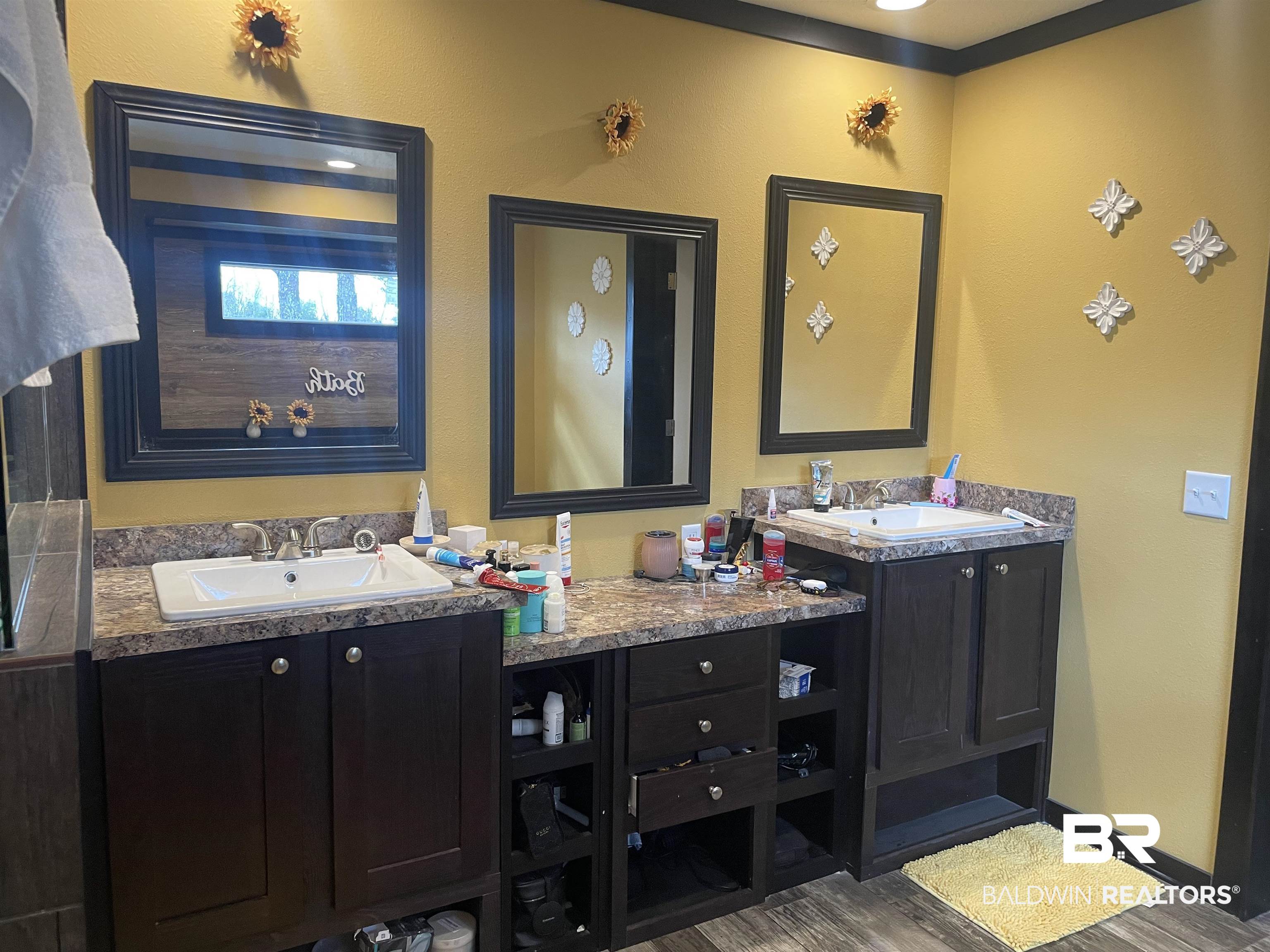 21593 Hubbard Road Robertsdale, AL 36567 - Photo 9 of 22 Bathroom with baseboards, wood finished floors, and vanity