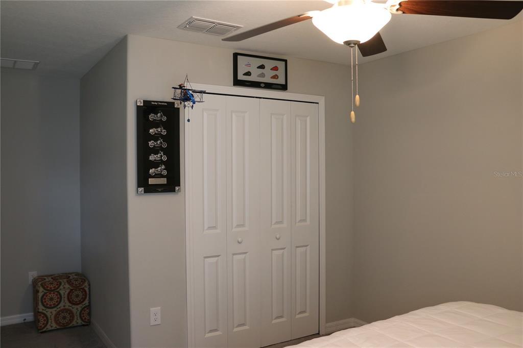 16554 Delia Street Wimauma, FL 33598 - Photo 23 of 44 a view of a hallway with elevator