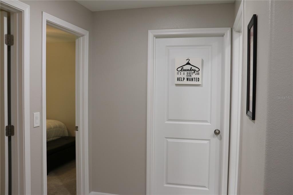 16554 Delia Street Wimauma, FL 33598 - Photo 29 of 44 a view of a hallway