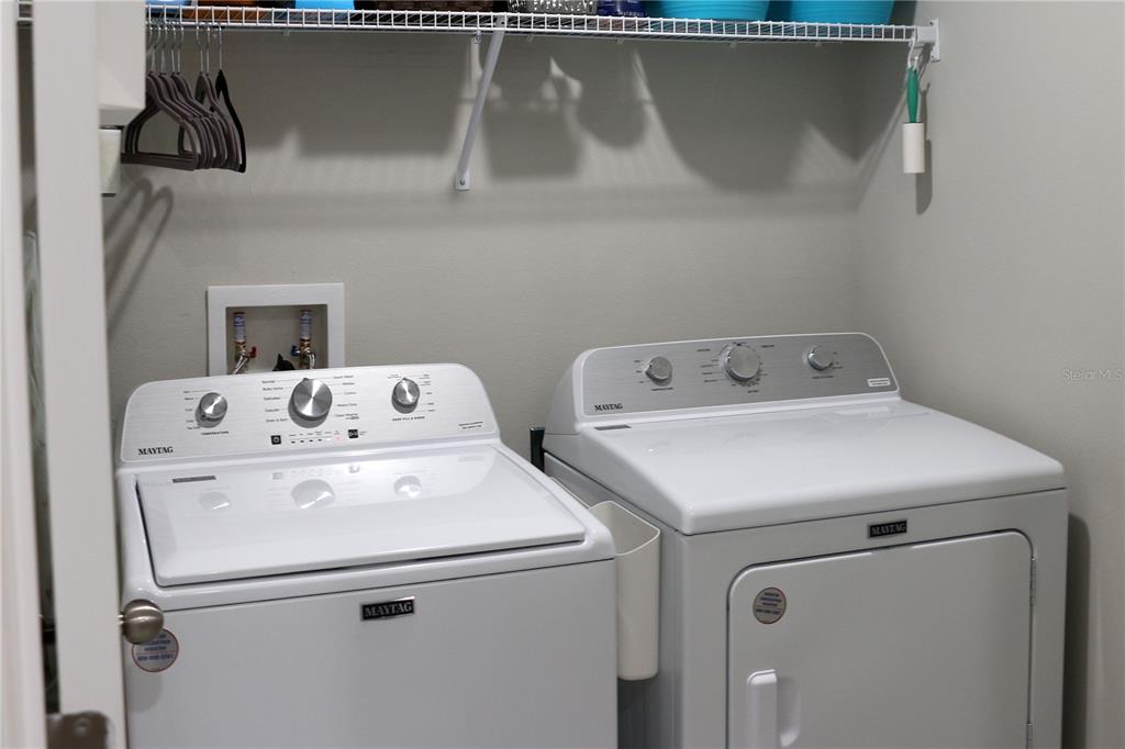 16554 Delia Street Wimauma, FL 33598 - Photo 30 of 44 a utility room with dryer and washer