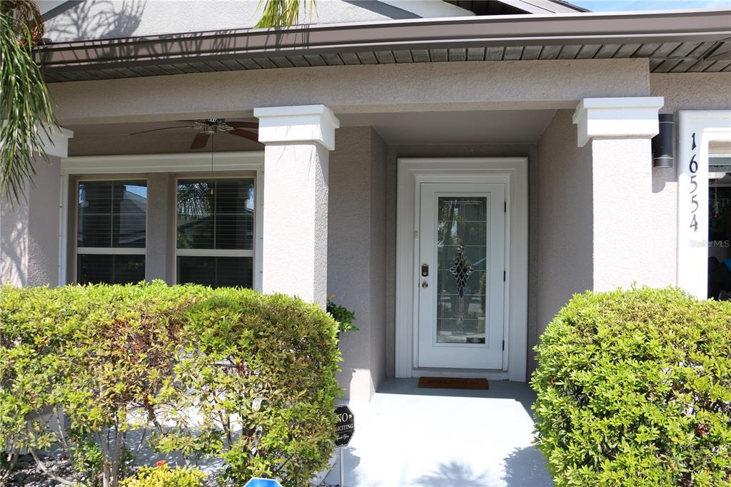 16554 Delia Street Wimauma, FL 33598 - Photo 7 of 44 a view of entrance space of the house
