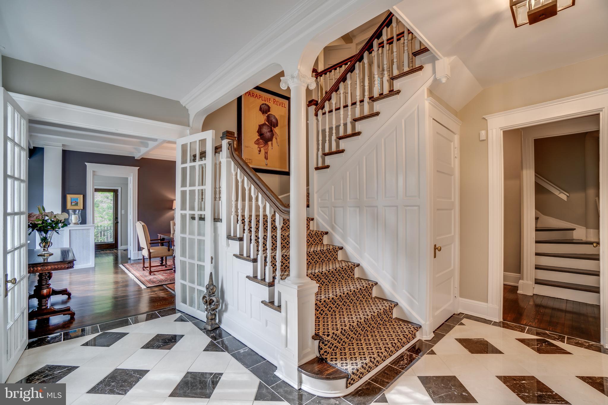 3405 North Glebe Road Arlington, VA 22207 - Photo 8 of 43 Main and secret staircase: crema marfil floor