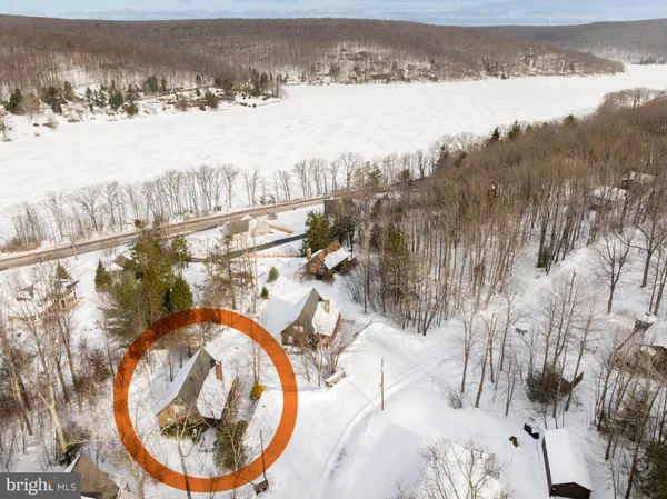 a view of swimming pool from a lake