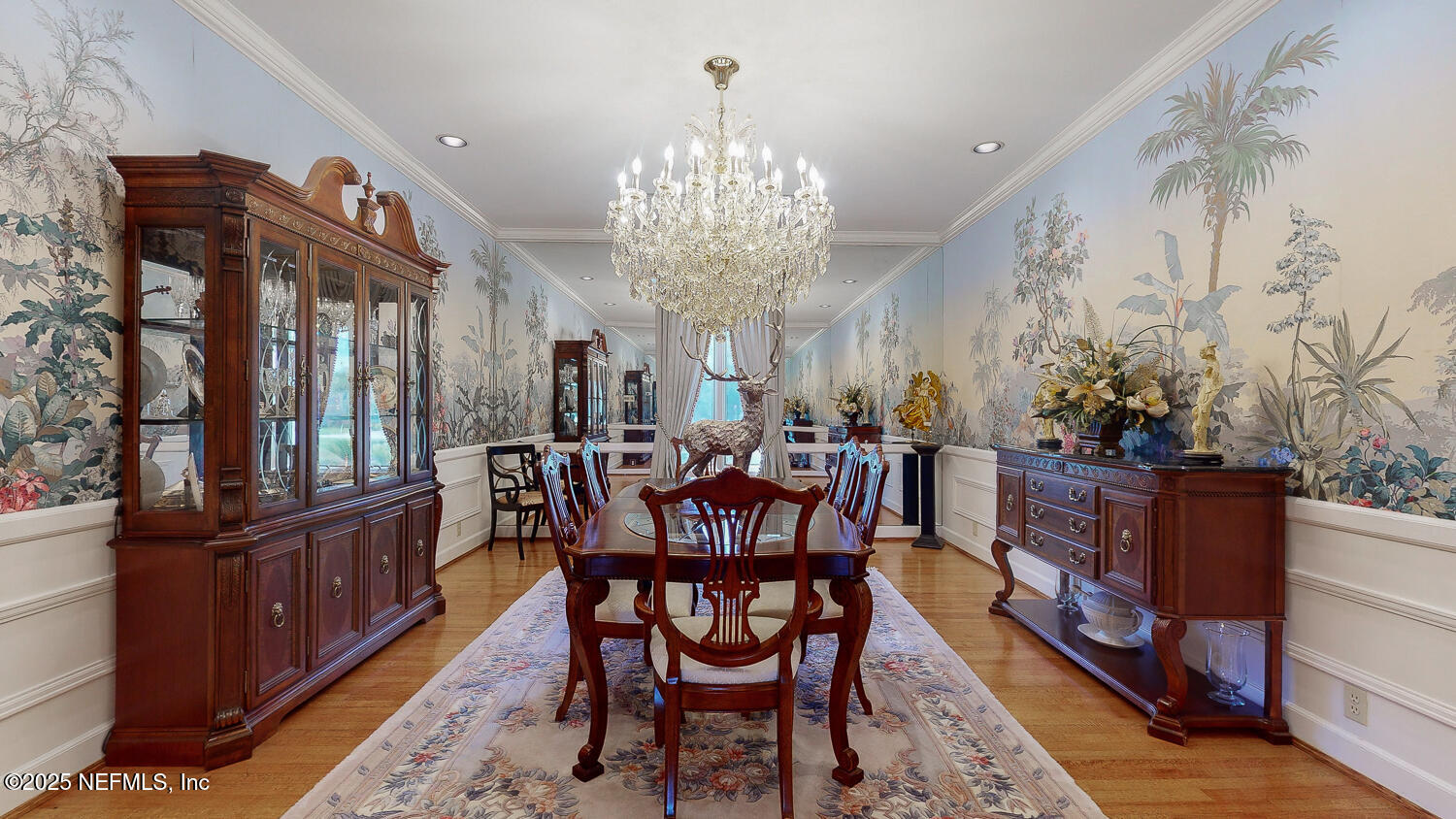 7987 Hollyridge Road Jacksonville, FL 32256 - Photo 17 of 55 a view of a dining room with furniture and chandelier