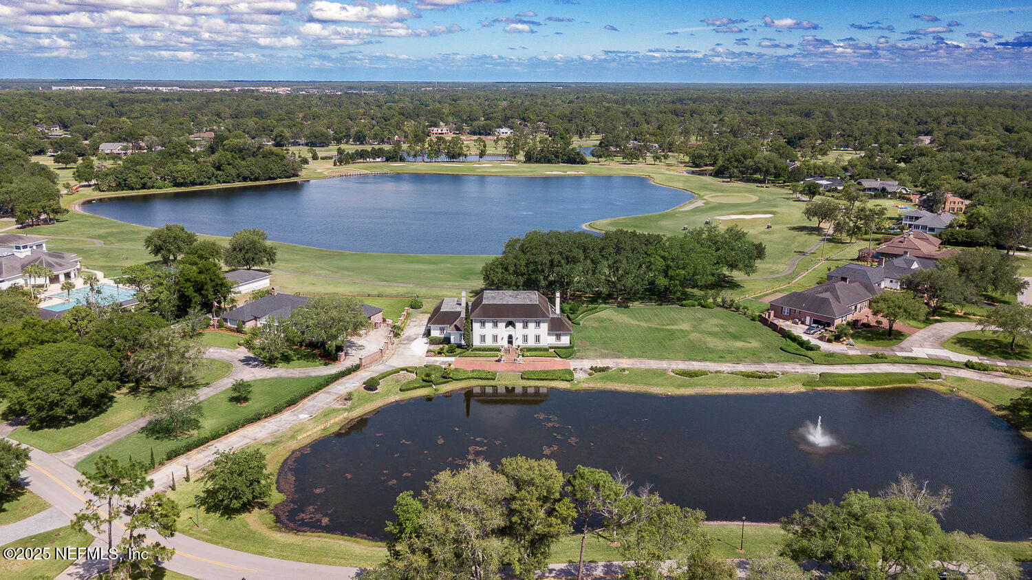 7987 Hollyridge Road Jacksonville, FL 32256 - Photo 22 of 55 an aerial view of a house with a yard